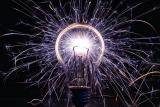 A lightbulb emitting many sparks